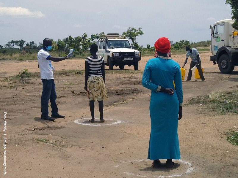 Datei:Uganda project update corona.jpg